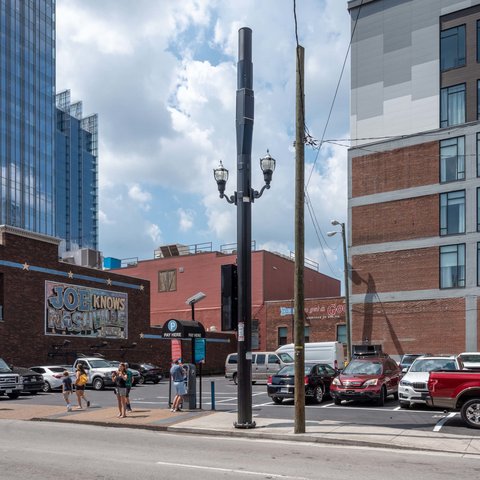 Small-cell street pole with shrouded antennas